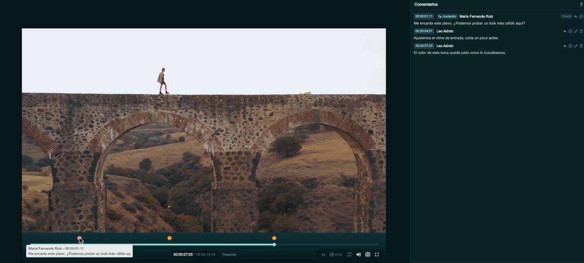 Marcadores de comentarios sobre la barra de reproducción, con las iniciales de quien comenta